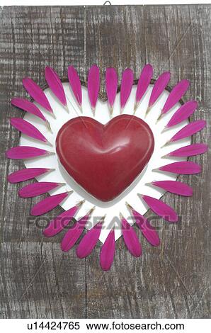Board with a heart and petals View Large Photo Image Stock Photography - Board with a heart and petals. Fotosearch