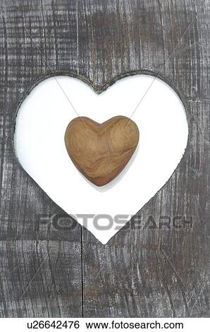 Stock Photograph - Board with a heart. Fotosearch
