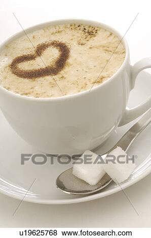 Stock Photo - Cappuccino with a chocolate heart. Fotosearch