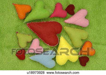 Stock Photo - Colorful hearts made of felt. Fotosearch