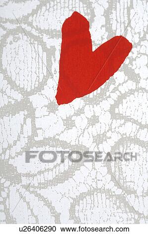 Stock Image - Red heart on a flowery pattern. Fotosearch
