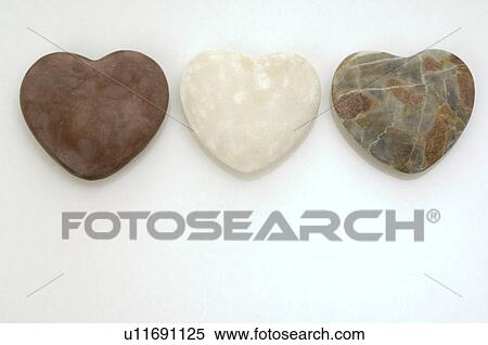 Stock Photography - Three heartshape stones. Fotosearch