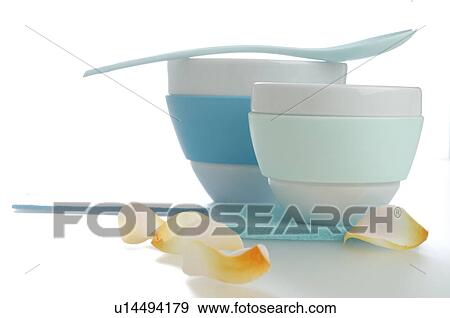 Stock Photo - Bowls, spoon and petals. Fotosearch