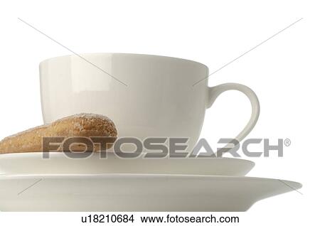 Picture - Coffee cup with a biscuit. Fotosearch