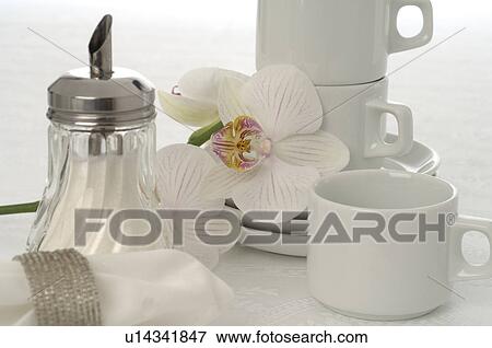 Stock Photo - Coffee set with a sugar caster. Fotosearch