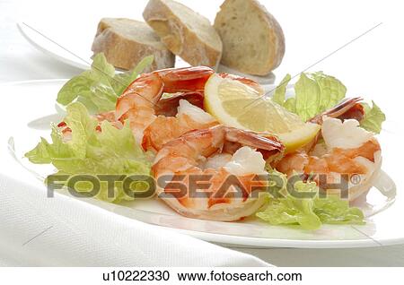 Dish of shrimps, lemon and salad View Large Photo Image Stock Image - Dish of shrimps, lemon and salad. Fotosearch