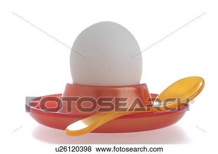 Egg in an eggcup View Large Photo Image Stock Photo - Egg in an eggcup. Fotosearch