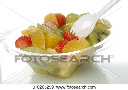Stock Photo - Fruit salad in a plastic bowl. Fotosearch