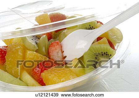 Fruit salad in a plastic bowl View Large Photo Image Stock Photo - Fruit salad in a plastic bowl. Fotosearch