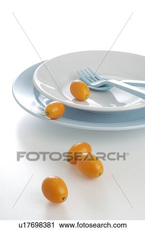 Light blue place setting with cumquat View Large Photo Image Stock Image - Light blue place setting with cumquat. Fotosearch