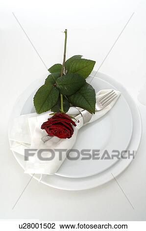Place setting with a red rose View Large Photo Image Stock Image - Place setting with a red rose. Fotosearch