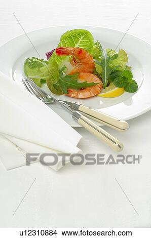 Picture - Shrimps with salad and lemon. Fotosearch