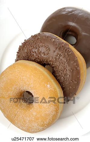 Stock Photo - Three doughnuts. Fotosearch