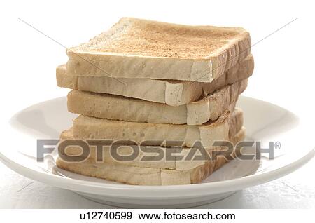 Toast on a plate View Large Photo Image Stock Photo - Toast on a plate. Fotosearch