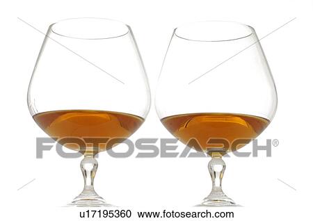 Stock Image - Two glasses of cognac. Fotosearch