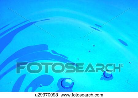 Stock Photo - Blue water, bubbles. Fotosearch