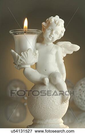 Christmas angel candlestick View Large Photo Image Stock Photo - Christmas angel candlestick. Fotosearch