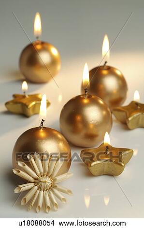Golden Christmas candles View Large Photo Image Picture - Golden Christmas candles. Fotosearch