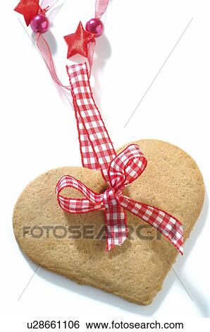Stock Photograph - Heartshape Christmas biscuit. Fotosearch