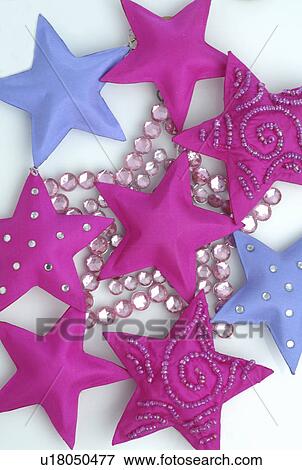 Stock Photo - Pink Christmas stars. Fotosearch
