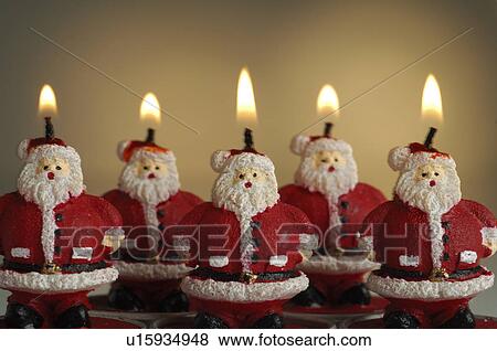 Stock Photo - Santa Claus candles. Fotosearch