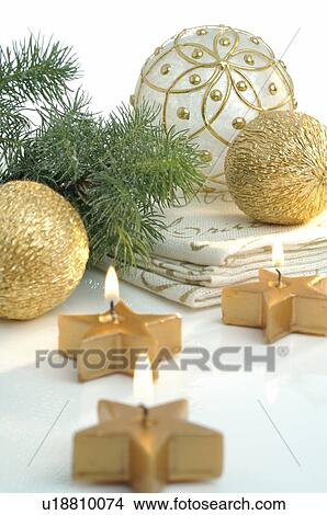 Picture - Starshape Christmas tea candle. Fotosearch