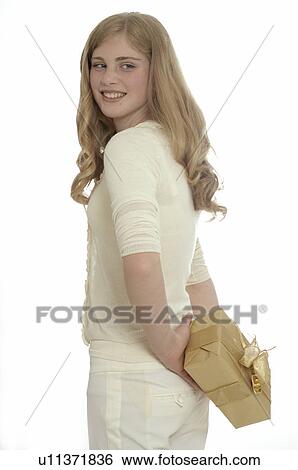 Woman with a Christmas gift View Large Photo Image Stock Photograph - Woman with a Christmas gift. Fotosearch