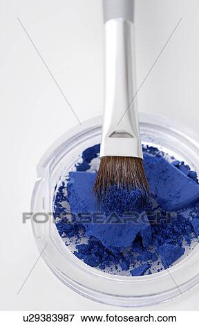 Stock Photo - Blue powder and brush. Fotosearch