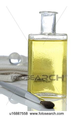 Bottle of perfume and brush View Large Photo Image Stock Photo - Bottle of perfume and brush. Fotosearch