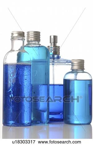 Four fragrance bottles View Large Photo Image Stock Photo - Four fragrance bottles. Fotosearch