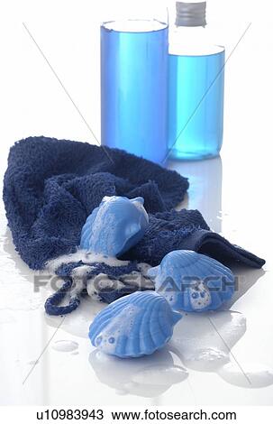 Stock Image - Sea shell shaped soap and towel. Fotosearch
