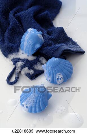 Stock Image - Sea shell shaped soap and towel. Fotosearch