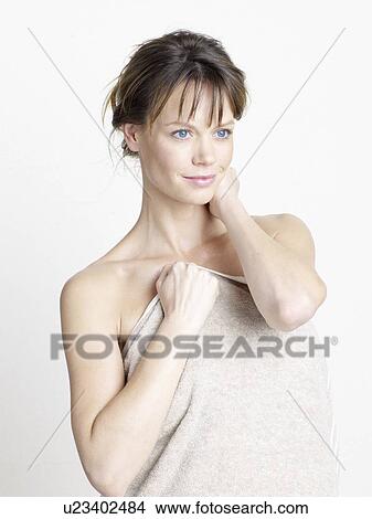 Woman with towel View Large Photo Image Picture - Woman with towel. Fotosearch