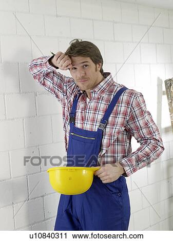 Construction worker with helmet View Large Photo Image Stock Image - Construction worker with helmet. Fotosearch