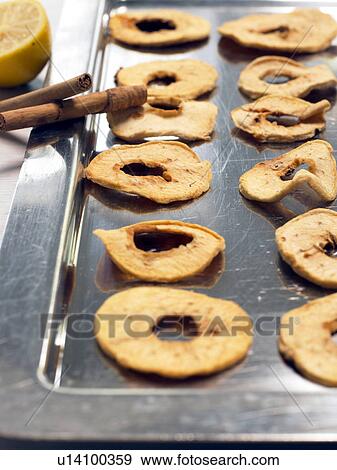 Stock Photo - close-up dried apples. Fotosearch