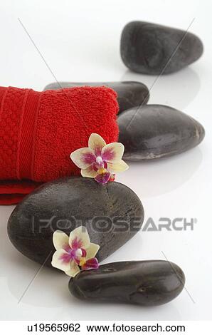 Red towels and black stones View Large Photo Image Stock Image - Red towels and black stones. Fotosearch