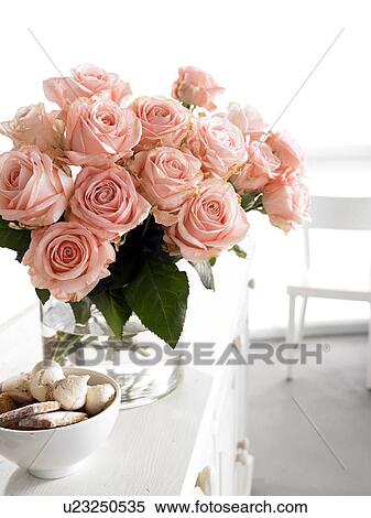 roses in a glass vase View Large Photo Image Stock Photography - roses in a glass vase. Fotosearch