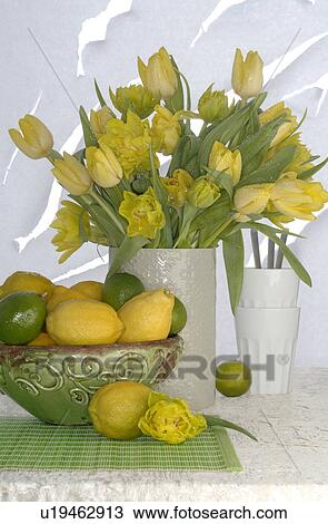 Stock Image - yellow springtime flower arrangment. Fotosearch