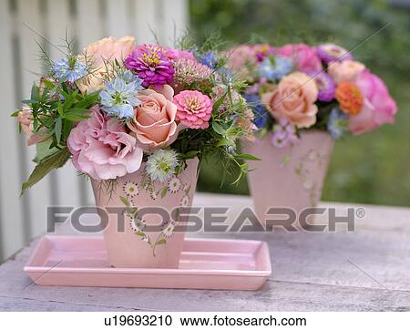 Stock Image - Bunch of roses in pastel shades. Fotosearch