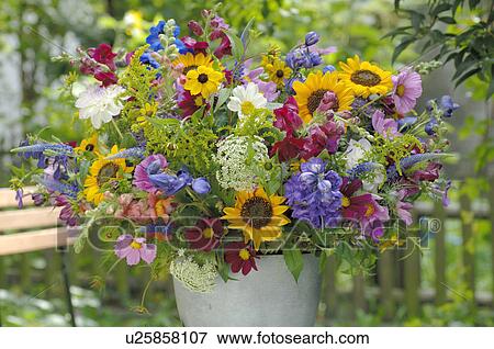 Flowers on the garden table View Large Photo Image Stock Photo - Flowers on the garden table. Fotosearch