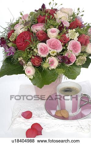 Precious bunch of roses on coffee table View Large Photo Image Stock Photo - Precious bunch of roses on coffee table. Fotosearch