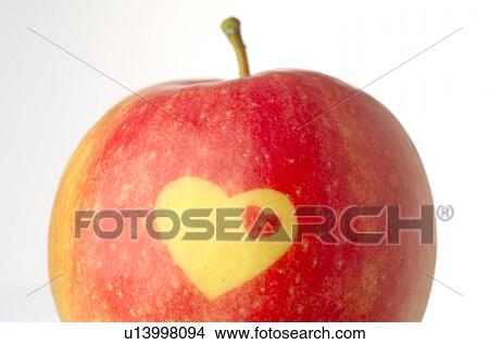 Apple with decorative heat form View Large Photo Image Picture - Apple with decorative heat form. Fotosearch