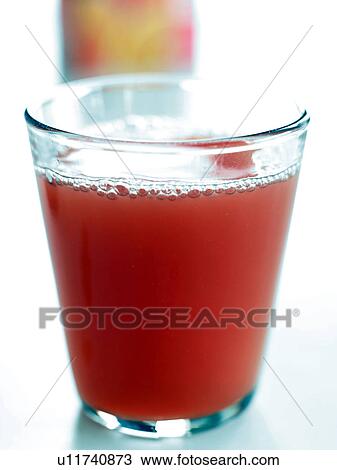 Glass of rhubarb juice View Large Photo Image Stock Image - Glass of rhubarb juice. Fotosearch