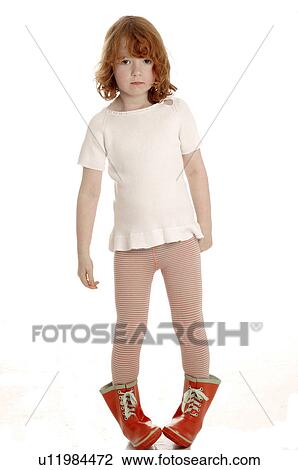 Red haired child with red rubber boots View Large Photo Image Stock Image - Red haired child with red rubber boots. Fotosearch