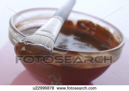 Bowl filled with chocolate mask View Large Photo Image Stock Photo - Bowl filled with chocolate mask. Fotosearch