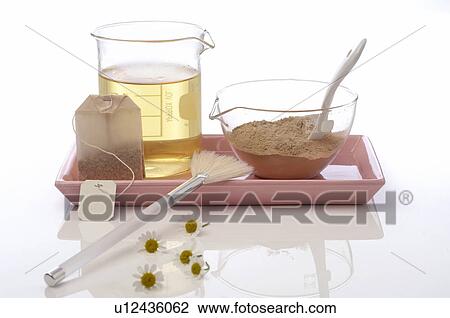 Mask with healing mud and camomile tea View Large Photo Image Stock Image - Mask with healing mud and camomile tea. Fotosearch