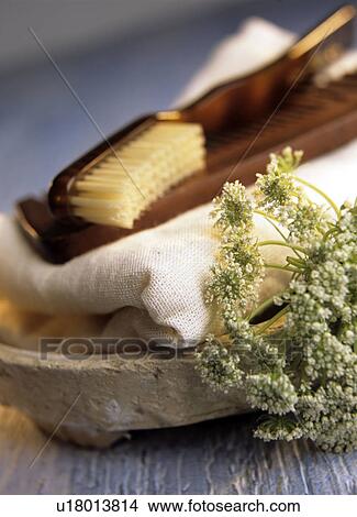 Picture - Toothbrush and comb on a natural-colored fabric. Fotosearch