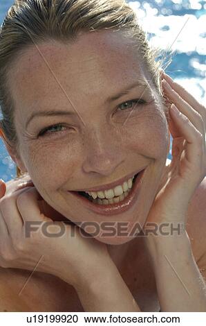 Woman resting head on her hands View Large Photo Image Stock Image - Woman resting head on her hands. Fotosearch