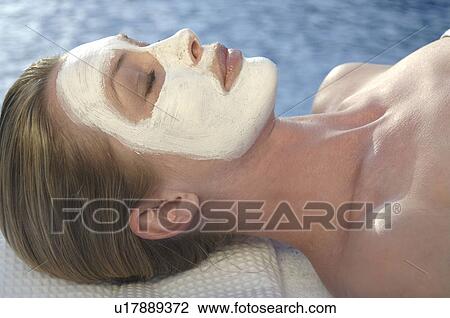 Woman with face mask View Large Photo Image Stock Image - Woman with face mask. Fotosearch