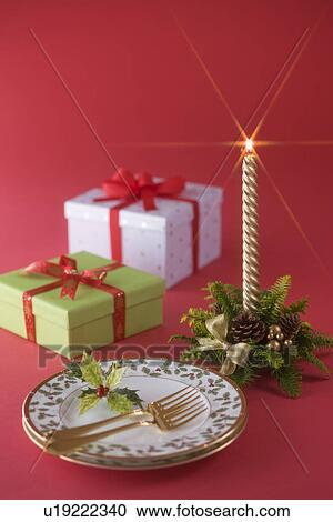 Stock Image - Christmas Candle and Plate. Fotosearch